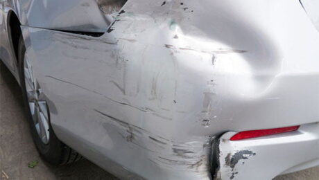 Rear bumper of car showing damage from a hit and run accident.