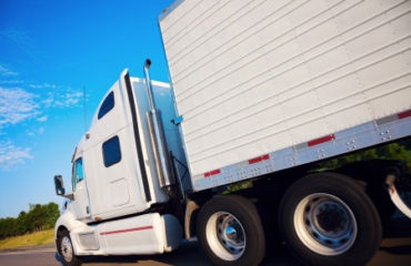 Commercial trucking semi rig on Kansas highway