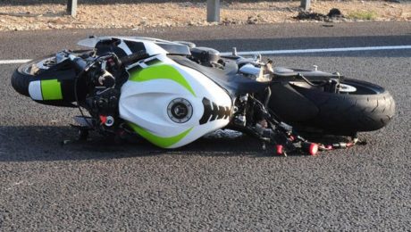 Motorcycle wrecked in roadway