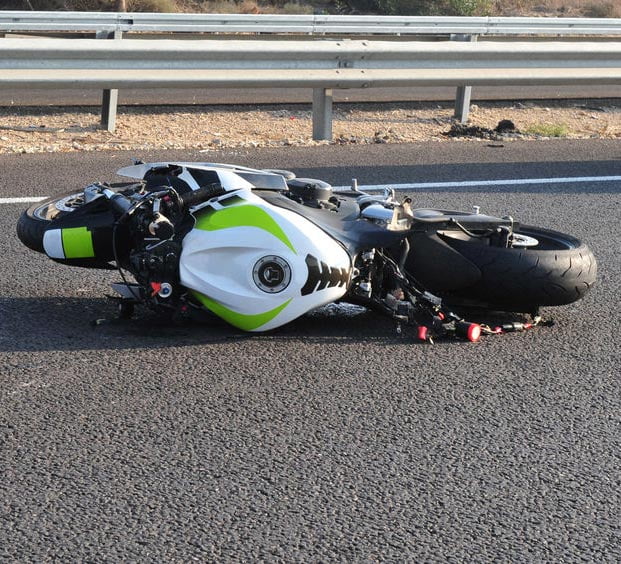 Motorcycle wrecked in roadway