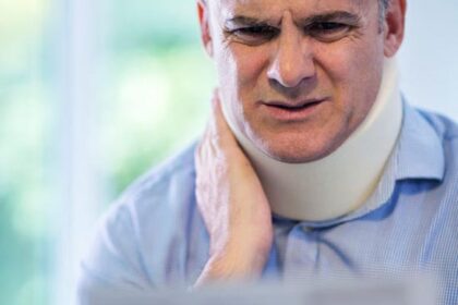 Mature man with whiplash injury