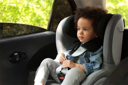 Young child in car seat. Young child in car seat.