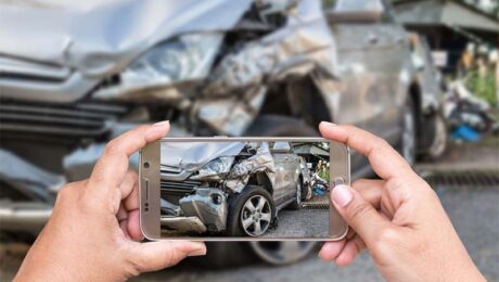 Photos being taken of car wreck Photos being taken of car wreck