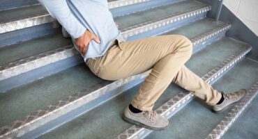 Adult male slipped and fell down stairs at the store