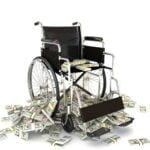 Wheelchair with pile of money indicating high medical costs