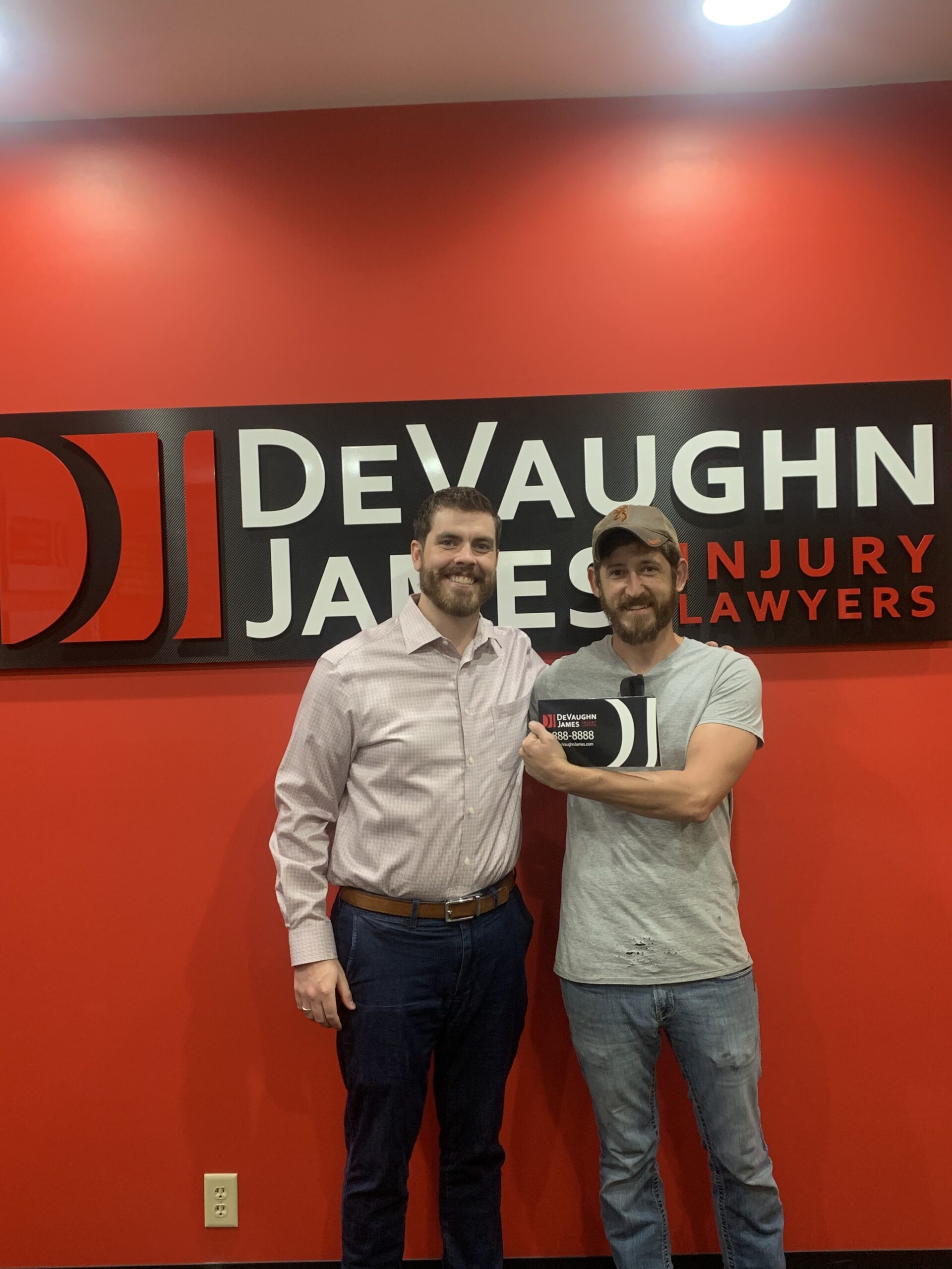Attorney Nick French with client J.E.
