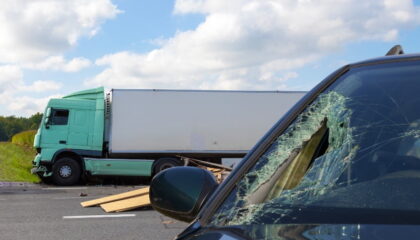 Commercial truck and normal passenger vehicle in an accident.