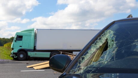 Commercial truck and normal passenger vehicle in an accident.