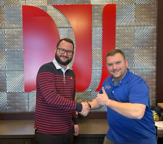 Attorney Chris Omlid with client G.F.