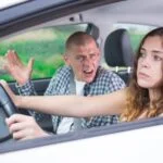Passenger in sedan distracting driver