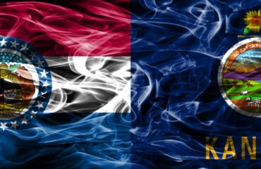 Image of the Missouri state flag and the Kansas state flag