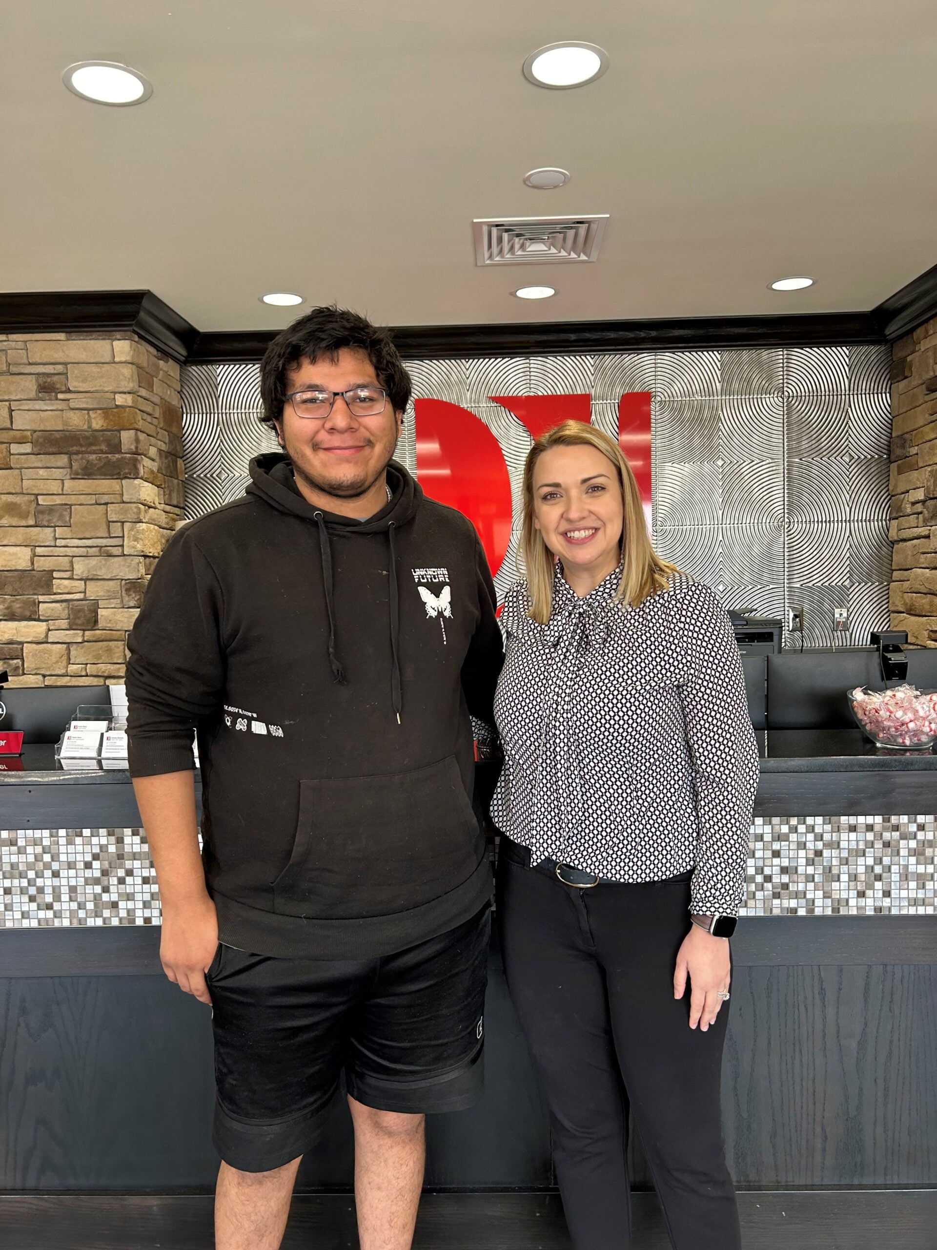 Attorney Jessica Brunken with client J.A.