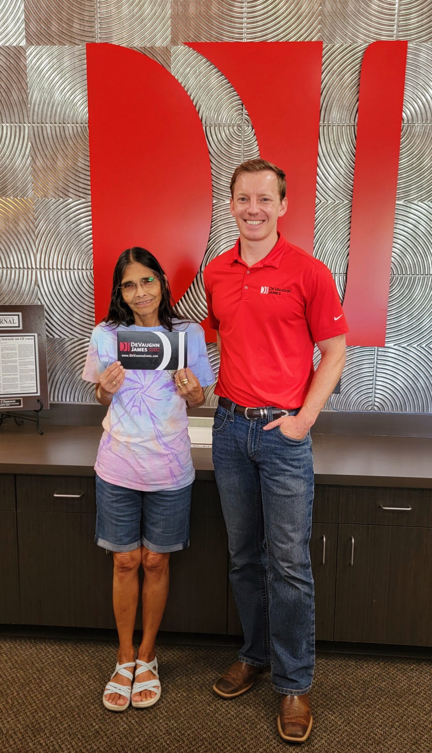 Kansas personal injury attorney Sam Frost with client R.G.