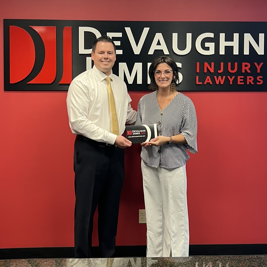 Personal injury attorney Taylor Connolly with client S.S.